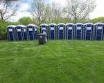 Portable Restrooms by Summit City Rental presented at the Michiana Wine Festival in downtown Fort Wayne, IN at Headwaters Park.